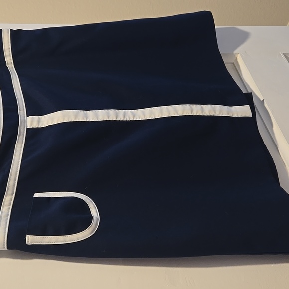 Izod Golf Navy Skirt with White Accent Trim - Picture 3 of 11